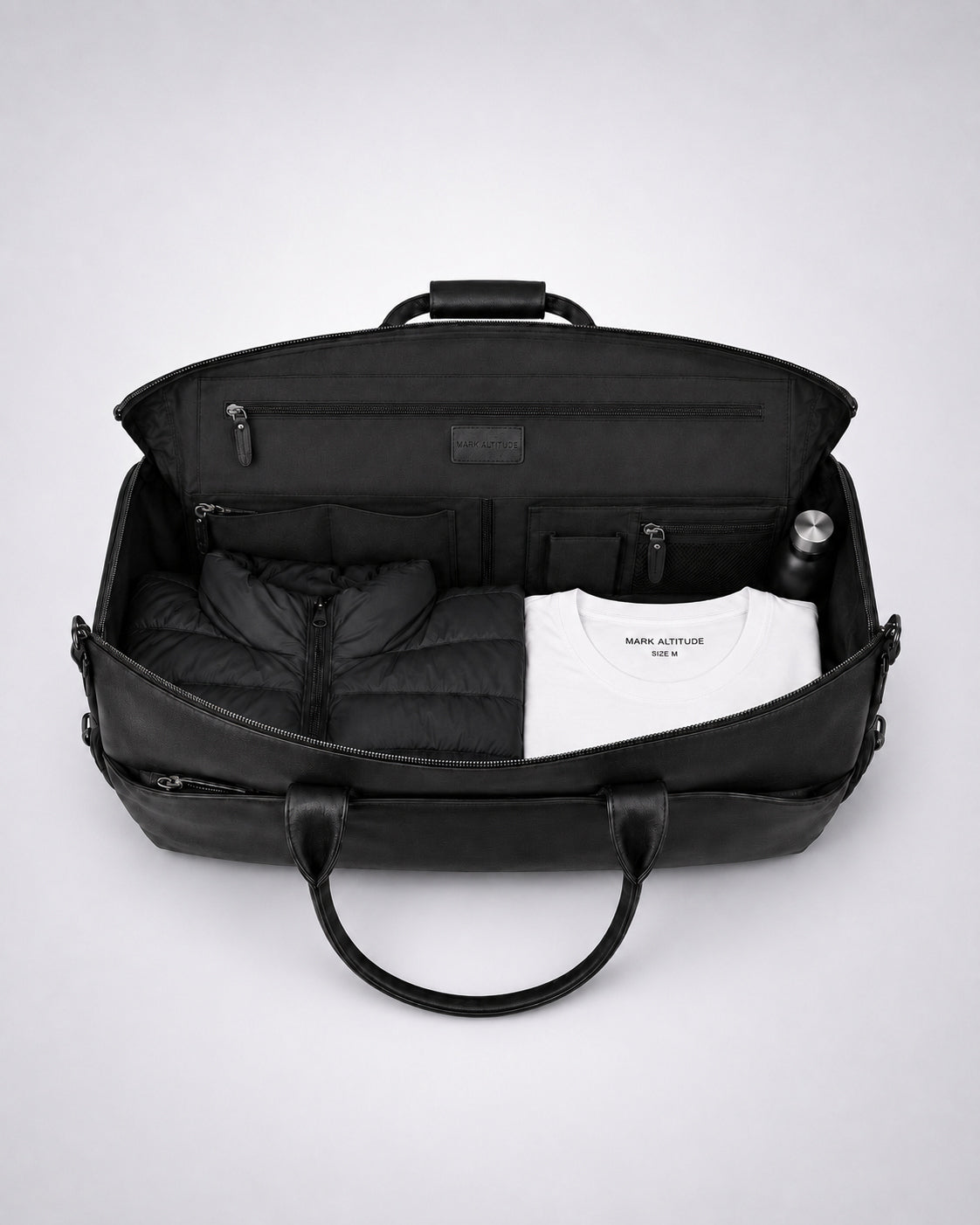 Compartimento principal del bolso de viaje de cuero C-01.